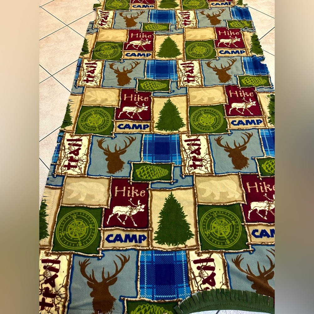 Quilt, home maid 4’3” x 7.5’. Heavy and warm. Fall or Winter decor.